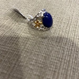 Ring with blue stone